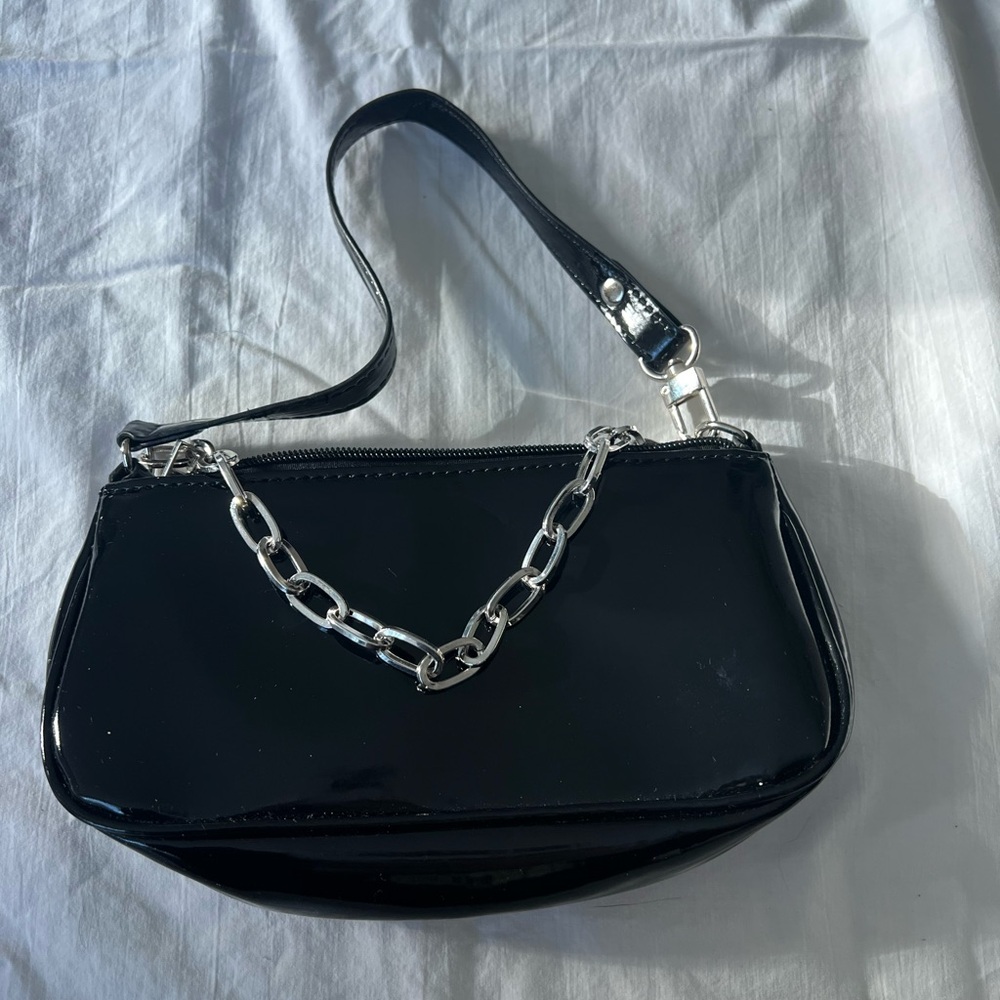 black faux patent leather with silver tone chain bag